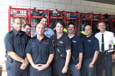 Members of Engine 239 after rescuing a man from the Gowanus Canal on May 9. (L to R) FF Darrell Couch, FF Frank Staiti from Engine 151, FF Richard Staiti, Capt. Edward Watt, FF Neil Malone, FF Robert Tomasulo, FF John Dearruda and Deputy Chief Michael Halderman of Div. 8.