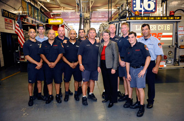 Secretary of Homeland Security Janet Napolitano with the members of Engine 39 and Ladder 16.