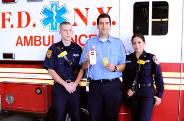 (L to R) EMT Andrew Gabor, Capt. John Scotch and EMT Claudia Rugel. Capt. Scotch is holding a yellow GasAlert Extreme Carbon Monoxide monitor and a monitor that assesses CO levels in victims.