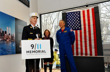 Chief of Department Edward Kilduff thanks Astronaut Mike Massimino at the National 9/11 Memorial and Museum as he stands with Museum Director Alice Greenwald.