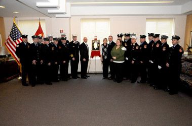 Marine Sergeant Christopher Hrbek's family, Fire Commissioner Salvatore Cassano, Chief of Department Edward Kilduff, members of Rescue 1 and Engine 59