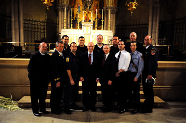 (L to R) Father James Ross Smith, DC James Hodgens, FF John Paul Rosselli, FF Mike Terriberry, FF Chris Viola, Fire Commissioner Salvatore Cassano, FF Mike Eddy, Dr. Leroy Sharer, FF Mark Browne, Ricardo Miranda, Lt. Scott Barvels, Father Stephen Gerth, BC Jerry Horton.