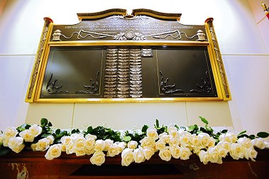 The Memorial Wall honoring the 55 members who have died as a result of World Trade Center-related illnesses. It hangs in the lobby of FDNY Headquarters.