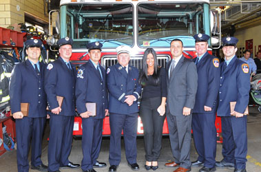 Firefighters from Ladder 86 with Damion Del Corsano and Erica Lack from Liberty Mutual.