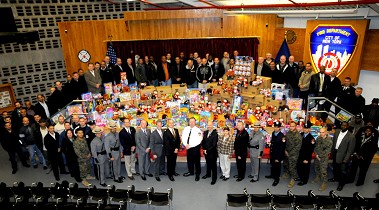 FDNY members at the Fire Academy partnered with the New York State Police Troop NYC on Dec. 8 to donate more than 2,000 toys to the U.S. Marine Corps' Toys-for-Tots program.