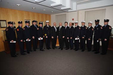 The scholarship recipients with Fire Commissioner Salvatore Cassano, Chief of Department Edward Kilduff, NYSHFCA President Michael Hill, NYSHFCA Vice President David Gold and NYSHFCA Chairman Howard Borkan.