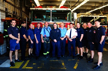 The members of Engine 225 and Ladder 107.