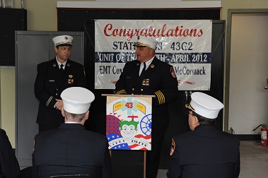Chief of EMS Abdo Nahmod speaks to the crowd, praising the EMTs' great work.