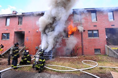 Firefighters battle a cellar fire on Governors Island, to help the FDNY, NIST and UL learn more about the science behind today's fires
