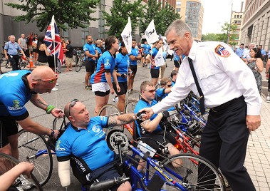 FDNY Chief of Department Edward Kilduff meets a few of the Wounded Warriors.