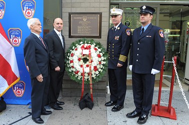 A wreath was lain at the plaque honoring the 12 members who died in the 23rd Street fire on Oct. 17, 1966.
