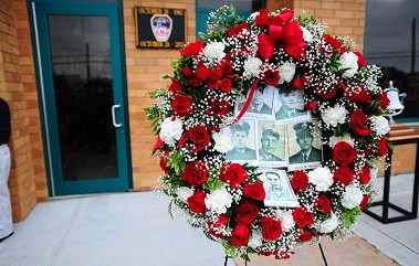 A wreath at the plaque honoring the firefighters who died in Maspeth on Oct. 26, 1962.