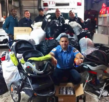 Capt. Mark Bonilla with some of the items collected as part of the 'Team Bonilla Hurricane Relief Drive.'