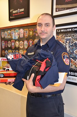 Paramedic Stephen Rogers with just a few of the items donated for Nathan Norman.