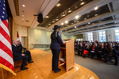 Firefighter Regina Wilson, who was honored at the event, addresses the crowd.