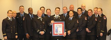 Capt. Paul Miller with members from his firehouse.