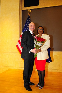 Fire Commissioner Salvatore Cassano and Christopher Afuwah's widow, Vivian.