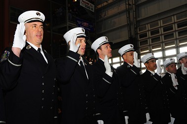 The 10 captains take the Oath of Office.