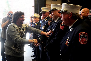 EMS Lt. Ralph Goyenechea meets Joseph Barone for the first time since his rescue