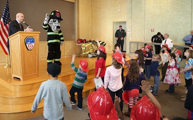 Fire Commissioner Salvatore Cassano swears in Junior Firefighters and Paramedics during Take Your Child to Work day at FDNY Headquarters.