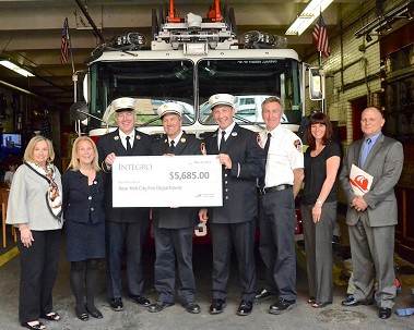 Officers from Division 1, Battalion 6 and Ladder 3 with represenatatives from Fireman's Fund (Roger Morelli), Integro Insurance Brokers (Carmel Fauci) and the Gramercy Park Block Assocation (Arlene Harrison).