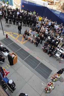Fire Commissioner Salvatore Cassano addresses the crowd at the plaque dedication.