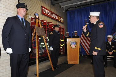 Former U.S. Marines from the firehouse are Honor Guard for a plaque dedicated to Firefighter Eugene Studer, Engine 81, who died in World War II.
