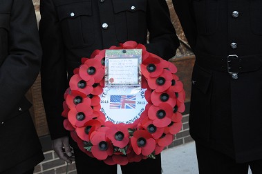 The wreath of poppies laid at the Memorial Wall.