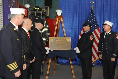 A plaque is unveiled honoring Ladder 49's centennial.