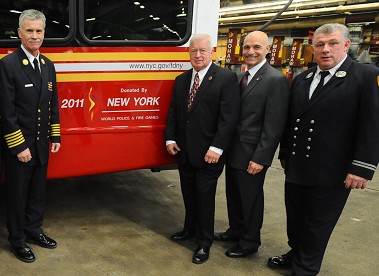 Chief of Department Edward Kilduff, World Police and Fire Games President Jim Carney, Fire Commissioner Salvatore Cassano and World Police and Fire Games CEO Capt. Joseph Brosi.