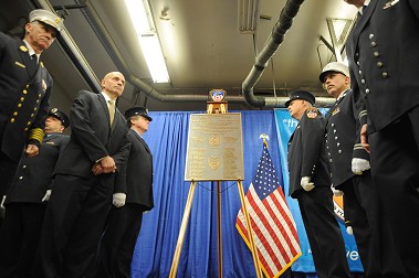 The centennial plaque is dedicated at Engine 94/Ladder 48.