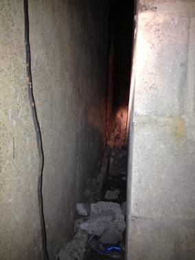 The 10 in. alleyway where the victim was stuck.