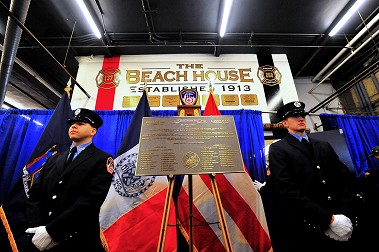 The centennial plaque with the Honor Guard.
