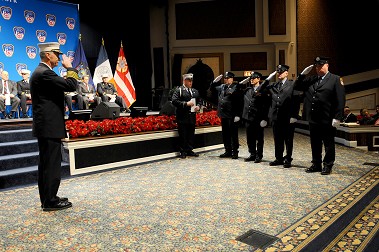 The new Marine Wipers salute Chief of Department Edward Kilduff before they were promoted.