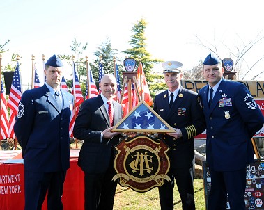 (L to R) Senior Master Sergeant Paul Piazza, Fire Commissioner Salvatore Cassano, Chief of Department Edward Kilduff and Senior Master Sergeant Charles Morris.