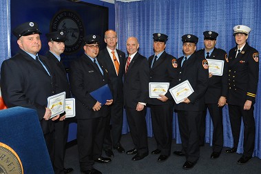 Fire Commissioner Salvatore Cassano and Staten Island District Attorney Daniel Donovan with the FDNY paramedics honored for their life-saving rescues using Naloxone.