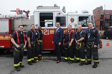 Mr. Nigro with the members of Engine 21, the first fire company with which he worked.