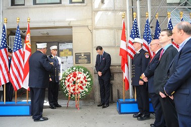 A plaque is dedicated on the side of the Ritz Tower on 57th Street in Manhattan honoring the eight FDNY members who died at that location in 1932.
