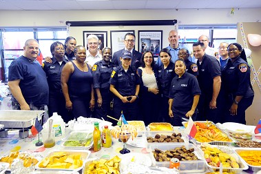 Fire Commissioner Daniel Nigro and his Executive Officer Elizabeth Cascio with the members of Station 58.