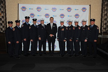Fire Commissioner Daniel Nigro (center) with the FDNY heroes.