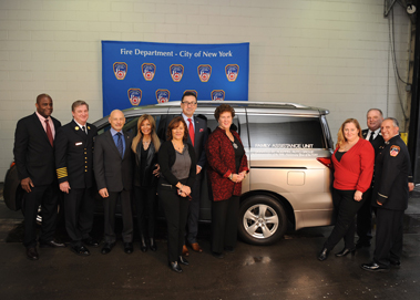 (L to R) First Deputy Commissioner Robert Turner; Chief of Department James Leonard; Mark Lacher, Koeppel Auto Group; Sue Lacher; Evelyn Tesoriero, Senior Programming Officer at the Family Assistance Unit; Fire Commissioner Daniel Nigro; Jean O’Shea, Executive Director of the FDNY Foundation; Jennifer Steed, Family Liaison at the Family Assistance Unit; Lt. Michael Moog, Family Assistance Unit; and Lt. Gary Miller, Family Assistance Unit.