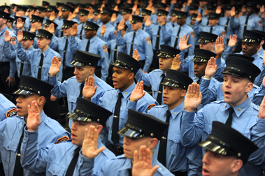 The new Probationary Firefighters take the Oath of Office.