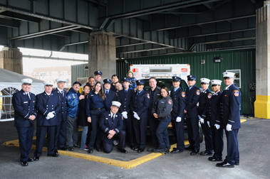 Paramedics and EMTs in front of their new station.