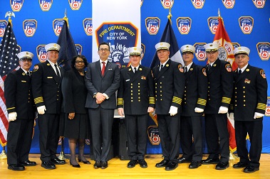 The newly appointed and promoted members. (L to R) Chief of EMS Communications Anthony Napoli; Chief of Training Stephen Raynis; Deputy Fire Commissioner, Chief Diversity and Inclusion Officer Pamela Lassiter; Fire Commissioner Daniel Nigro; Chief of Department James Leonard; Chief of Operations John Sudnik; Chief of EMS James Booth; Assistant Chief of EMS Michael Fitton; Chief of Fire Prevention Ronald Spadafora