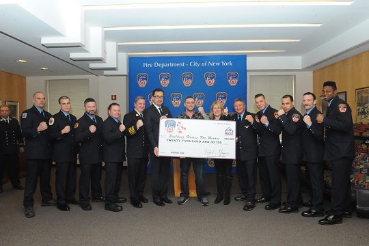 Fire Commissioner Daniel Nigro, Chief of Department James Leonard, Boxing Team President Firefighter Bobby McGuire, Director of Special Events and Corporate Relations for Building Homes for Heroes Carolyn Paszke, U.S. Marine Corporal Kevin Vaughan and the FDNY Boxing Team
