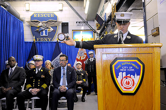 A plaque is dedicated honoring the firehouse's centennial.