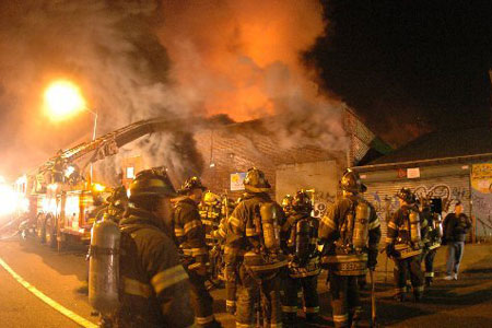 Firefighters battled a four-alarm fire in a one-story 25x100 brick commercial in East Williamsburg, Brooklyn. The building housed a kosher cold storage and ice cream packing facility. Thirty three units responded to the early morning fire that was brought under control in less than six hours. One firefighter was treated for minor injuries. The cause of the fire is under investigation. Photo by Firefighter Michael Gomez, Squad 288.