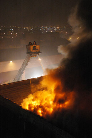 Firefighters battled a four-alarm fire in a one-story 25x100 brick commercial in East Williamsburg, Brooklyn. The building housed a kosher cold storage and ice cream packing facility. Thirty three units responded to the early morning fire that was brought under control in less than six hours. One firefighter was treated for minor injuries. The cause of the fire is under investigation. Photo by Firefighter Michael Gomez, Squad 288.