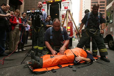 Firefighters Rescue Woman Who Fell Through Sidewalk Grating