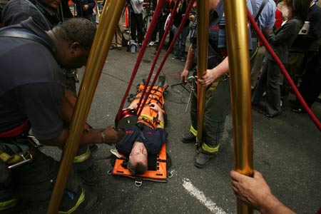 Firefighters Rescue Woman Who Fell Through Sidewalk Grating